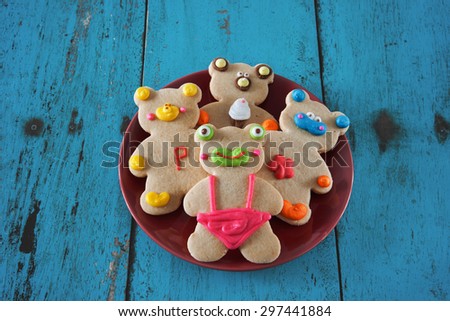 cute animal cookies on red plate