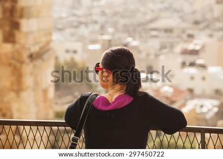 Female tourist looking Athens from Acropolis