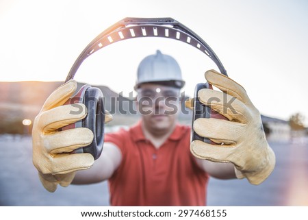 ear muff to protect workers' ears  Royalty-Free Stock Photo #297468155