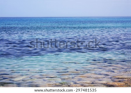 View on the sea with stone sea floor. Location Cala Pira, Sardinia.