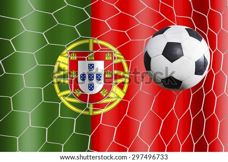 soccer ball in front of the Portugal flag