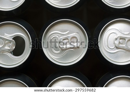 opened and closed canned drinks in black 