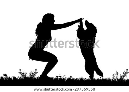 Vector silhouette of a woman with a dog on a meadow.