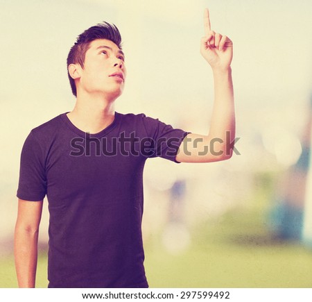 cool chinese-man pointing up