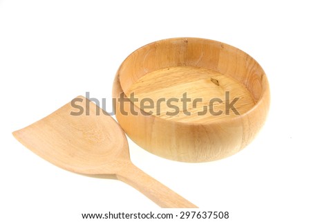 Empty wooden bowl and spoon  on white background.