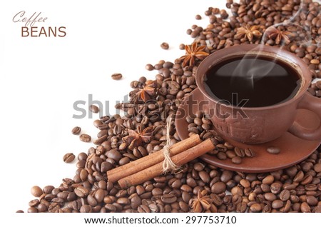 Coffee beans with spice and coffee cup isolated on white background