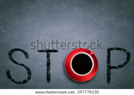 Word stop with cup of coffee instead of letter O