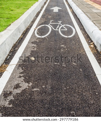 image of asphalt road and new bike lane with sign for background usage.