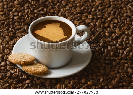 Still life photography of hot coffee beverage with map of Algeria