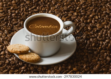 Still life photography of hot coffee beverage with text Colombia
