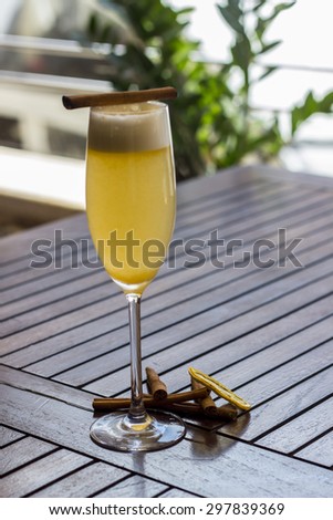 Cocktails with champagne, orange liqueur and cinnamon