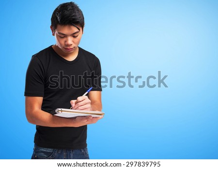 chinese man with a notebook