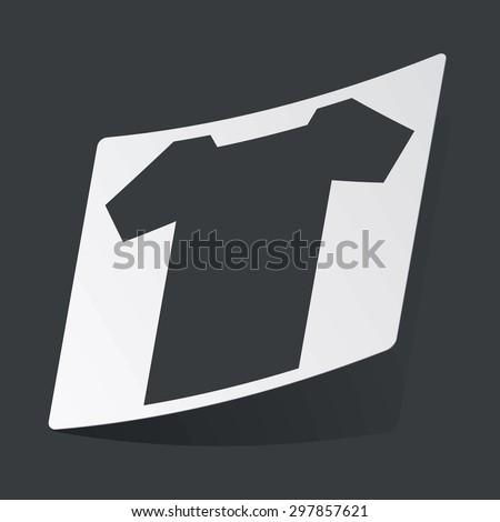 White sticker with black image of T-shirt, on black background