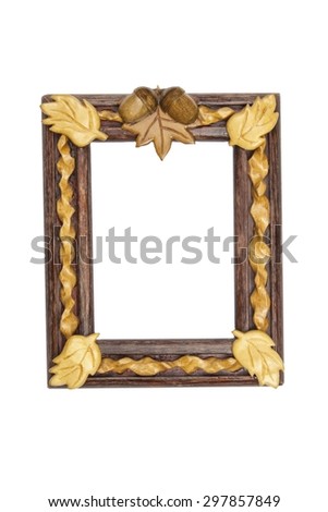 Painted wooden picture frame with the motif of oak leaves and acorns. Isolated on white.
