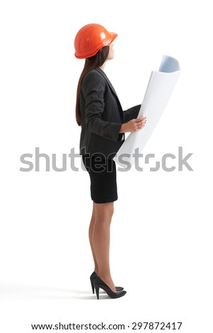 businesswoman in hardhat holding blueprint and looking up. isolated on white background