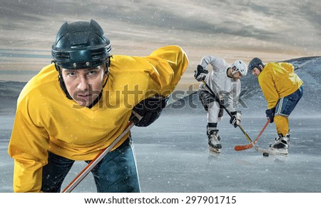 Ice hockey player on the ice in mountains