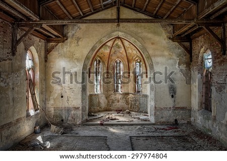 The interior of an abandoned church Royalty-Free Stock Photo #297974804