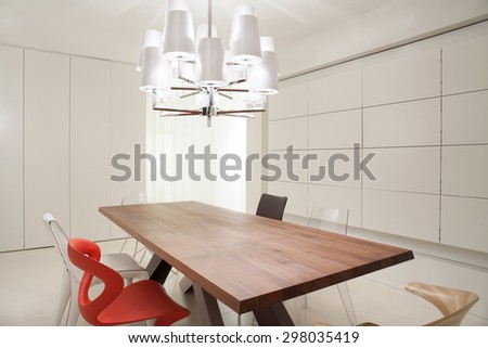 Close-up of designed chandelier in dining room
