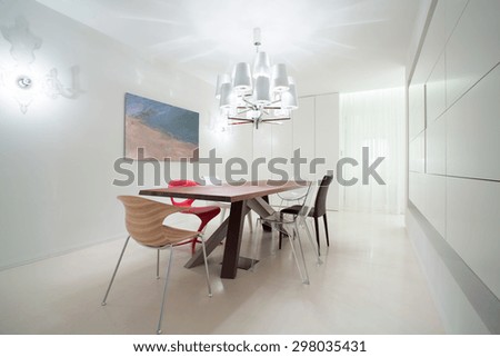 Various chairs in dining room in modern design
