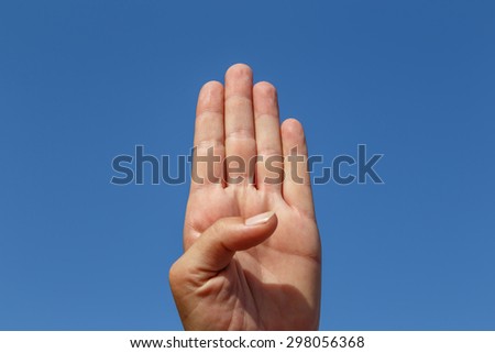 four empty finger with sky at background
