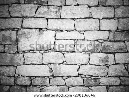 Old white stone wall, detailed background texture photo with vignette filter effect