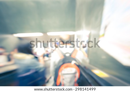 Blurred background of inside busy subway in asia