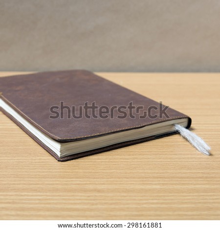 brown book on wood background
