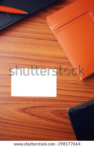 Blank business card at office