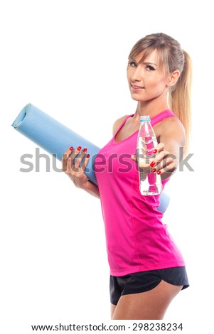 sport concept -beautiful slim sporty woman with yoga mat and water isolated on white background