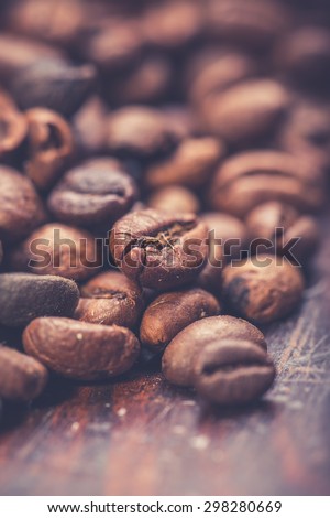Coffee beans on wooden background, Vintage food photo