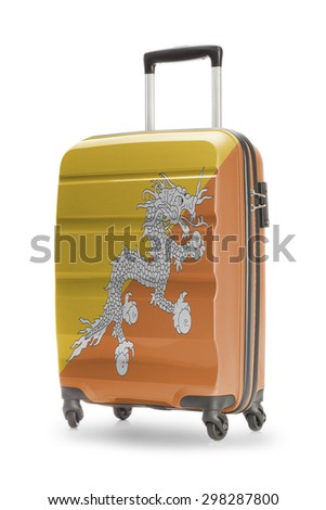 Suitcase painted into national flag - Bhutan
