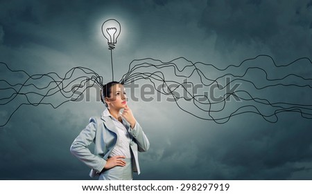 Young thoughtful woman and ideas coming out of her head