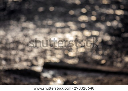 image of blur sea and canel bokeh in sunset  time with warm colo