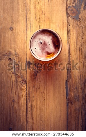 glass of fresh lager beer  Royalty-Free Stock Photo #298344635