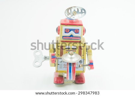Vintage tin toy robot white background
