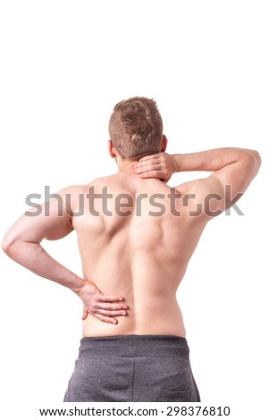 Young muscular man suffering from back pain