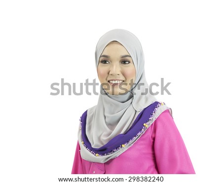 Portrait of young beautiful Asian muslim woman wearing hijab
