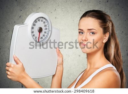Dieting, Weight Scale, Women. Royalty-Free Stock Photo #298409618