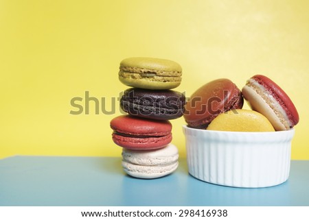 French macaroon  on yellow background