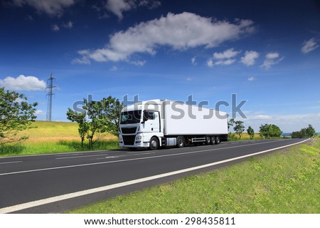 Truck transportation on the road Royalty-Free Stock Photo #298435811
