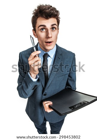 Excited man having an idea / photos of young businessman wearing  a suit and tie over white background