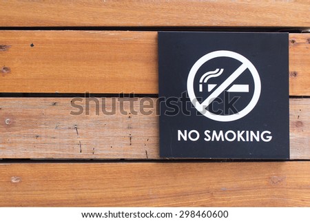 No Smoking Sign on wooden wall