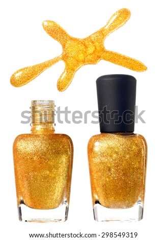 Golden nail Polish with sequins and drop. Photo.