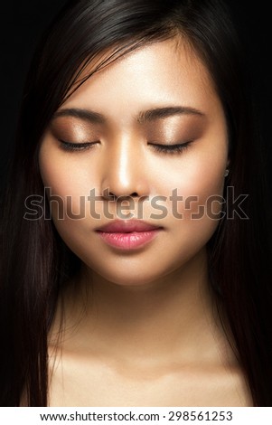 Beauty portrait of a girl in the studio
