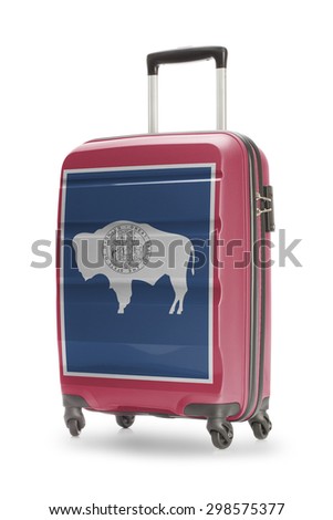Suitcase painted into US state flag - Wyoming