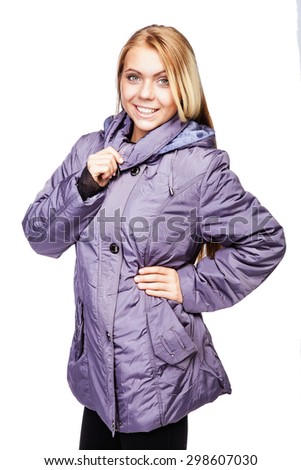 Young beautiful blonde girl in a violet  jacket with a zipper 
