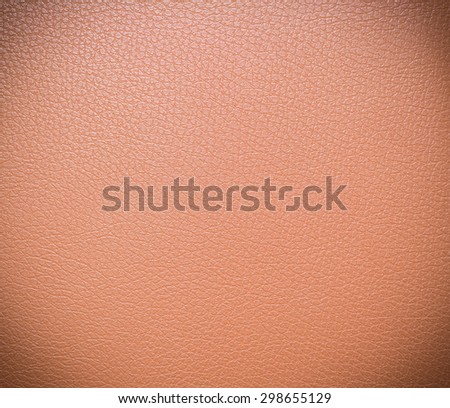 colorful background of detail on leather,with vignetting