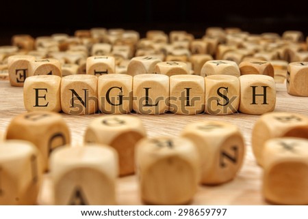 ENGLISH word written on wood block Royalty-Free Stock Photo #298659797