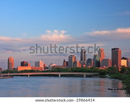 sunset in downtown Minneapolis with Mississippi river