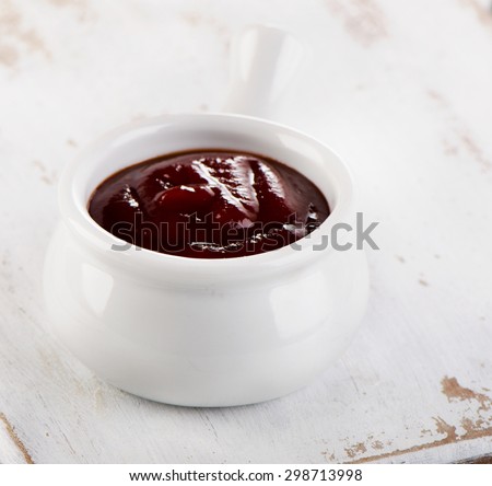 Bowl of barbecue sauce. Selective focus